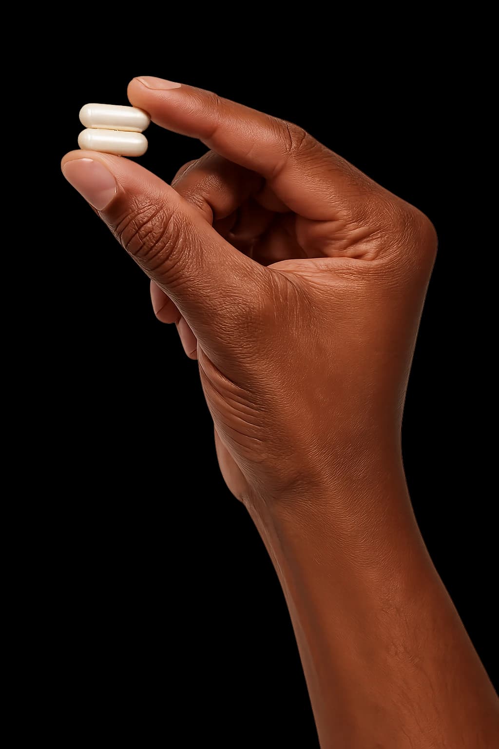 Hand met twee capsules van Morning Mate